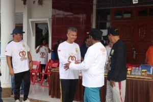 Kapolres Keerom Hadiri Jalan Santai Dalam Rangka HUT Kabupaten Keerom ke-22