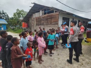 Program Si-IPAR Operasi Rasaka Cartenz 2025 Hadir Memberikan Kebahagiaan Bagi Anak-Anak di Kota Oksibil