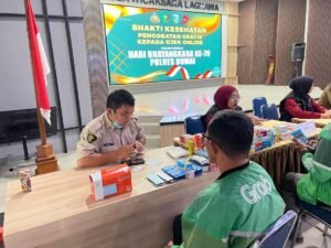 Sambut HUT Bhayangkara, Polres Dumai Beri Pengobatan Gratis hingga Sembako untuk Pengemudi Ojol