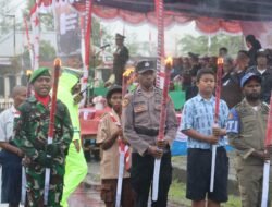 Sambut HUT RI Ke-80, Polres Yahukimo Gelar Upacara Taptu dan Pawai Obor
