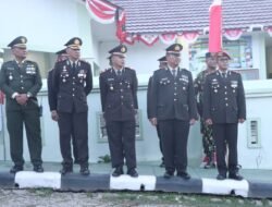 Polres Tolikara Hadiri Upacara Taptu dan Pawai Obor HUT RI ke-80 di Kabupaten Tolikara