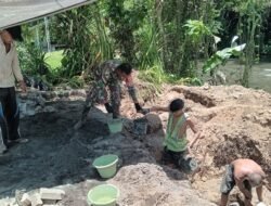 Percepat Progres Pembangunan, Babinsa Koramil 1310-06/Airmadidi Bantu Pemasangan Pondasi Dudukan Angker Jembatan Perintis Garuda di Kelurahan Rap-Rap