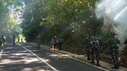 Kodim 1310/Bitung Bersama YTP 916/BS dan Masyarakat Gelar Kerja Bakti Gerakan Indonesia Asri, Bersihkan Jalan Penghubung Kasawari–Makawidey